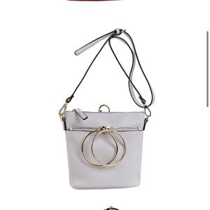 O RING CROSS BODY PURSE